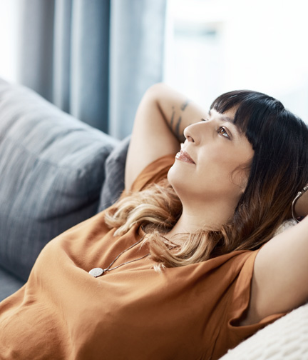 woman relaxed on couch